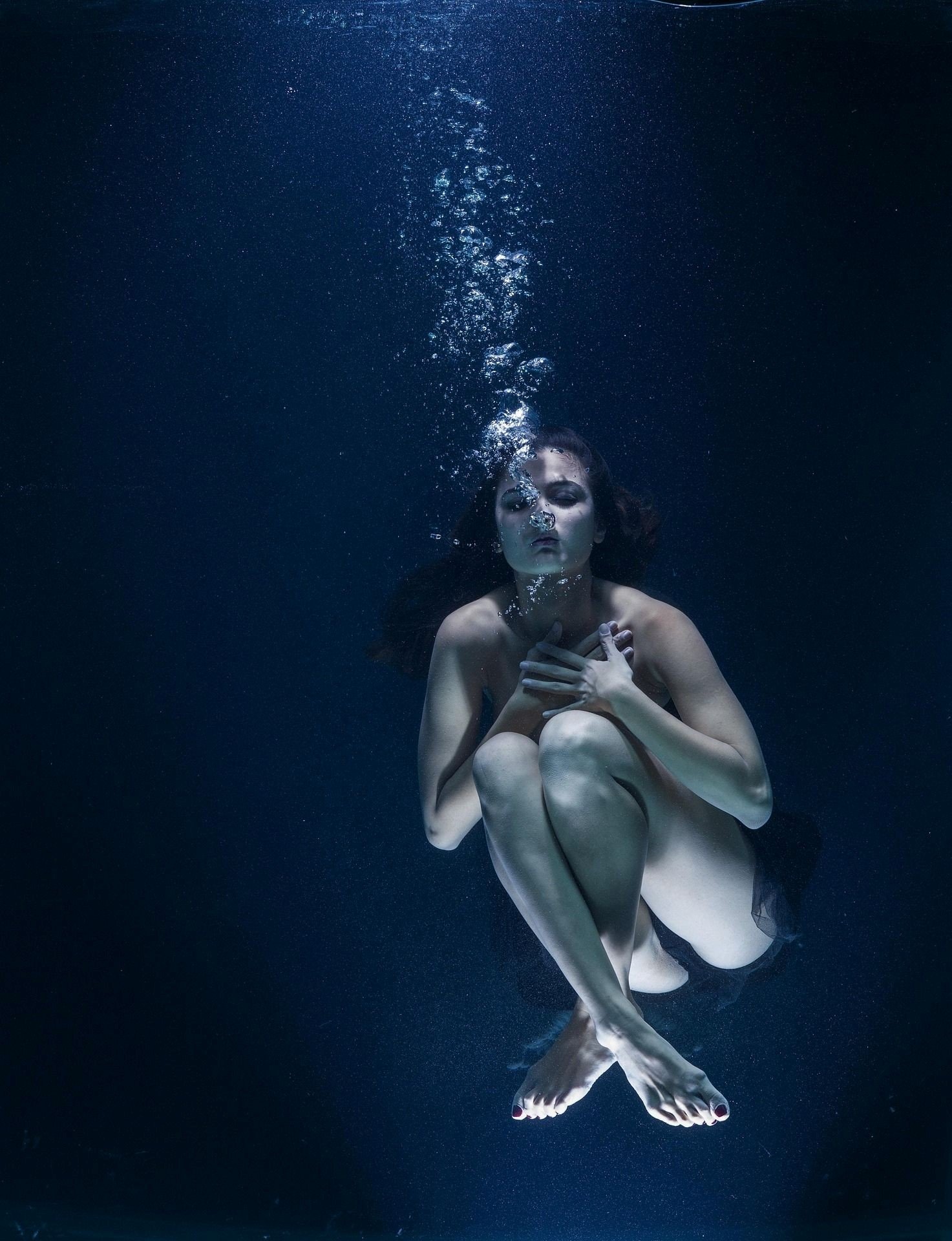Femme sou l'eau